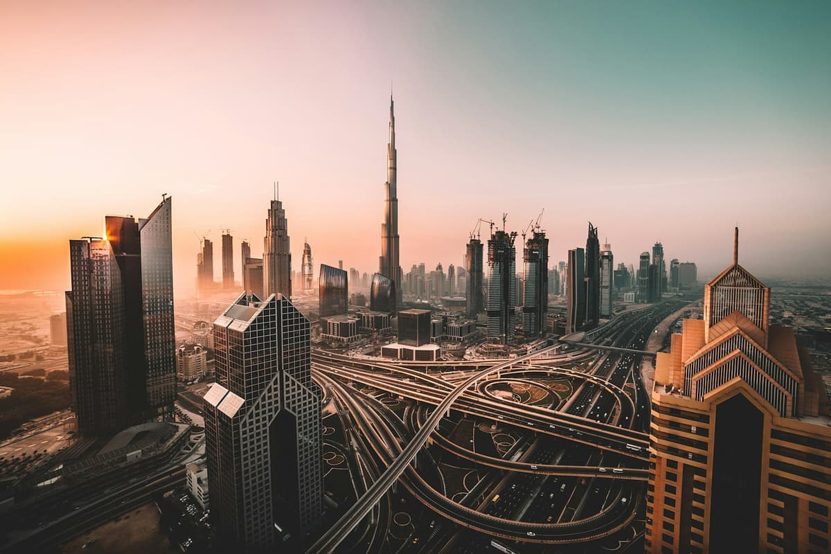 Gulf financial skyline at sunrise